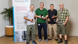 Group picture of the development team of the Proline Prosonic Flow P 500