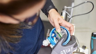 Endress+Hauser employee with product